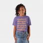 Little girl smiling wearing purple smart girls squad t-shirt for kids