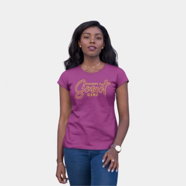 Woman with her hand on her leg wearing raising a smart girl t-shirt